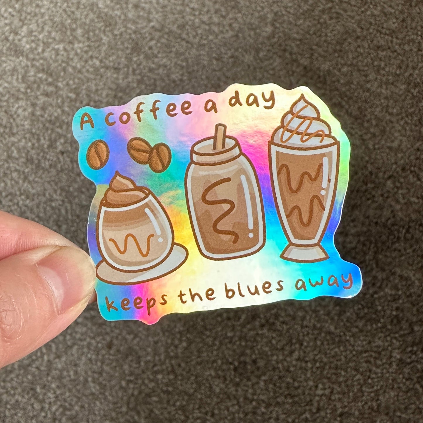 A coffee a day keeps the blues away Holographic Die Cut Sticker